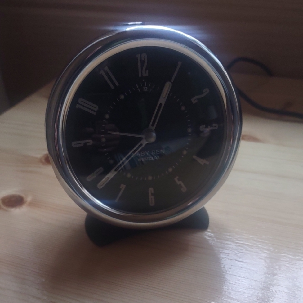 Black and Silver Alarm Clock